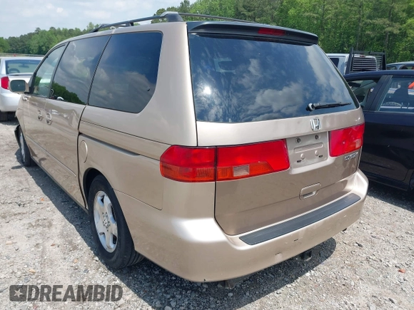 2000 Honda Odyssey EX with VIN 2HKRL1868YH513587, listed as a IAAI auction lot 42092115 with 302,555 mi miles and . Bid and sale history available at DreamBid. Image 3.