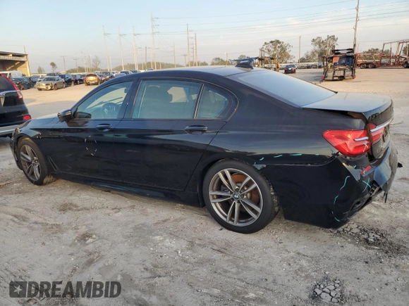 2018 BMW 7 Series 750i with VIN WBA7F0C5XJGM22674, listed as a Copart auction lot 74833524 with 0 mi miles and Salvage Title. Bid and sale history available at carsss.com. Image 2.