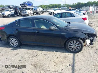 2014 Kia Optima EX with VIN 5XXGN4A70EG277871, listed as a IAAI auction lot 42183248 with 128,300 mi miles and . Bid and sale history available at carsss.com. Image 13.