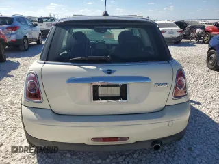 2013 MINI Hardtop with VIN WMWSU3C56DT682857, listed as a Copart auction lot 77677234 with 92,625 mi miles and Clean Title. Bid and sale history available at DreamBid. Image 6.
