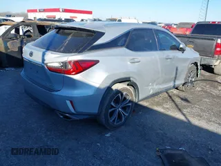 2018 Lexus RX 350 z VIN 2T2ZZMCA6JC096728, wystawiony jako IAAI lot #41356629 z przebiegiem 76 982 mil mil oraz . Historia ofert i sprzedaży dostępna na DreamBid. Obrazek 4.