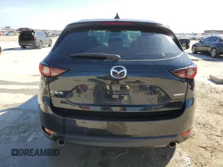 2020 Mazda CX-5 Sport with VIN JM3KFABM9L0729042, listed as a Copart auction lot 46681065 with 34,595 mi miles and Salvage Title. Bid and sale history available at carsss.com. Image 6.