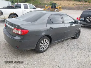 2012 Toyota Corolla L with VIN 2T1BU4EE3CC901530, listed as a IAAI auction lot 42099048 with 210,117 mi miles. Bid and sale history available at carsss.com. Image 4.