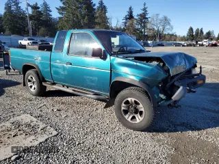 1996 Nissan Frontier XE with VIN 1N6SD16Y9TC338402, listed as a Copart auction lot 45058765 with 164,295 mi miles and Salvage title. Bid and sale history available at DreamBid. Image 4.