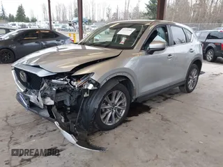 2020 Mazda CX-5 Grand Touring with VIN JM3KFADM0L0738693, listed as a IAAI auction lot 41725906 with 63,629 mi miles. Bid and sale history available at carsss.com. Image 2.