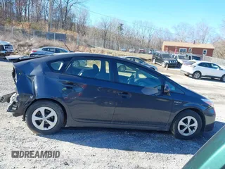 2015 Toyota Prius Four with VIN JTDKN3DU3F0460559, listed as a IAAI auction lot 41427463 with 112,083 mi miles and . Bid and sale history available at DreamBid. Image 14.