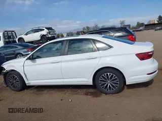 2021 Volkswagen Jetta S z VIN 3VWC57BU9MM034560, wystawiony jako IAAI lot #42239655 z przebiegiem 75 424 mil mil oraz . Historia ofert i sprzedaży dostępna na DreamBid. Obrazek 15.
