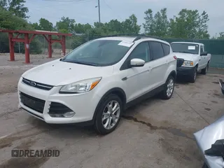 2013 Ford Escape SEL with VIN 1FMCU9H90DUC52981, listed as a IAAI auction lot 42506500 with 74,212 mi miles and . Bid and sale history available at DreamBid. Image 17.