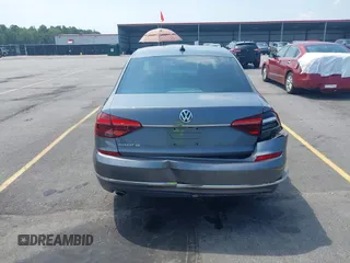 2017 Volkswagen Passat SE with VIN 1VWGT7A33HC058764, listed as a IAAI auction lot 42668036 with 76,732 mi miles and . Bid and sale history available at DreamBid. Image 16.