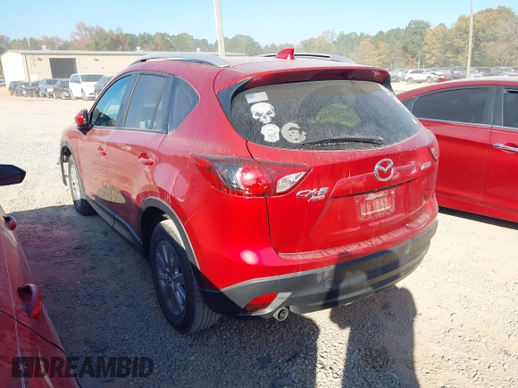 2015 Mazda CX-5 Touring with VIN JM3KE4CY6F0455468, listed as a IAAI auction lot 40669780 with 225,831 mi miles and . Bid and sale history available at carsss.com. Image 3.