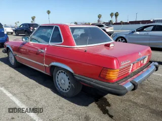 1987 Mercedes-Benz 560 SL z VIN WDBBA48D3HA066423, wystawiony jako Copart lot #57629115 z przebiegiem 75 756 mil mil oraz Tytuł czysty. Historia ofert i sprzedaży dostępna na DreamBid. Obrazek 2.