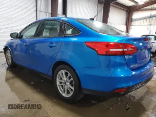 2015 Ford Focus SE with VIN 1FADP3F28FL237744, listed as a Copart auction lot 62307855 with 164,794 mi miles and Salvage title. Bid and sale history available at DreamBid. Image 2.