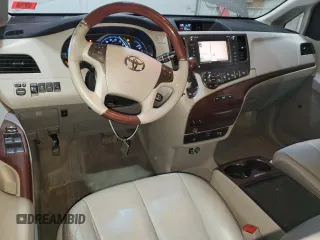 2012 Toyota Sienna XLE с VIN 5TDDK3DC5CS037368, выставлен на аукционе Copart как лот 49626985 с пробегом 164 431 миль миль и Списание • Salvage title. История ставок и продаж доступна на DreamBid. Изображение 8.