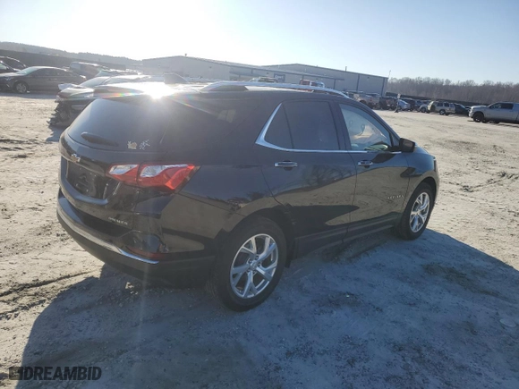 2021 Chevrolet Equinox Premier with VIN 2GNAXNEV5M6158792, listed as a Copart auction lot 86877674 with 54,247 mi miles and Salvage Title. Bid and sale history available at carsss.com. Image 3.