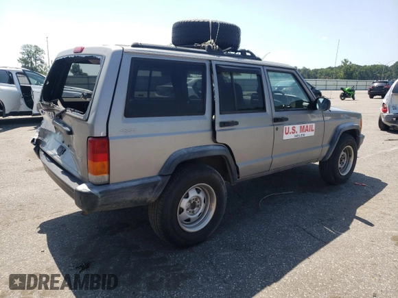 2000 Jeep Cherokee with VIN 1J4FN28S6YL210944, listed as a Copart auction lot 65163475 with 147,609 mi miles and Salvage title. Bid and sale history available at DreamBid. Image 3.