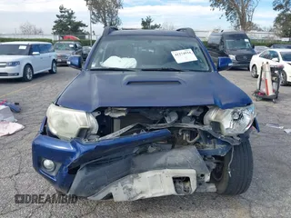 2015 Toyota Tacoma with VIN 3TMMU4FN0FM077148, listed as a IAAI auction lot 41274934 with 112,617 mi miles and . Bid and sale history available at DreamBid. Image 13.