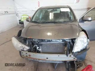2014 Nissan Versa SV with VIN 3N1CN7AP6EL821104, listed as a IAAI auction lot 41773957 with 167,287 mi miles. Bid and sale history available at carsss.com. Image 6.