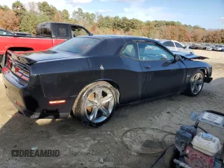 2015 Dodge Challenger R/T with VIN 2C3CDZAT1FH823432, listed as a Copart auction lot 77883964 with 126,929 mi miles and Salvage title. Bid and sale history available at DreamBid. Image 3.