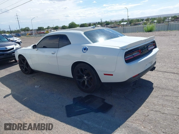 2015 Dodge Challenger SXT Plus with VIN 2C3CDZBG3FH913585, listed as a IAAI auction lot 42609599 with 85,524 mi miles and . Bid and sale history available at DreamBid. Image 3.