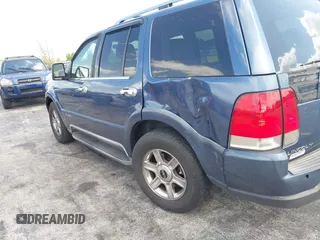 2003 Lincoln Aviator Luxury z VIN 5LMEU68H13ZJ46598, wystawiony jako IAAI lot #41985439 z przebiegiem 160 570 mil mil oraz . Historia ofert i sprzedaży dostępna na DreamBid. Obrazek 12.