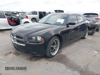 2014 Dodge Charger SE with VIN 2C3CDXBG2EH187978, listed as a IAAI auction lot 41246875 with 106,635 mi miles and . Bid and sale history available at DreamBid. Image 17.