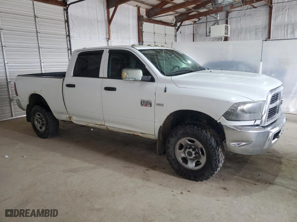 2011 Ram 2500 SLT with VIN 3D7TT2CT3BG566101, listed as a Copart auction lot 49774985 with 334,945 mi miles and Salvage Title. Bid and sale history available at carsss.com. Image 4.