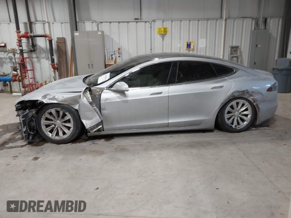 2017 Tesla Model S 100D with VIN 5YJSA1E23HF232059, listed as a IAAI auction lot 41394046 with 84,052 mi miles and . Bid and sale history available at DreamBid. Image 15.