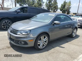2014 Volkswagen Eos Executive z VIN WVWFW8AHXEV004529, wystawiony jako Copart lot #58532495 z przebiegiem 98 789 mil mil oraz Czysty tytuł • Clean title. Historia ofert i sprzedaży dostępna na DreamBid. Obrazek 1.