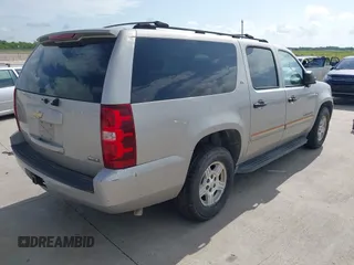 2007 Chevrolet Suburban LT with VIN 3GNFC16037G199184, listed as a IAAI auction lot 42666370 with 259,929 mi miles and . Bid and sale history available at DreamBid. Image 4.