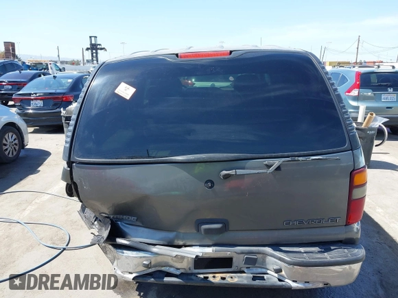 2002 Chevrolet Tahoe LS z VIN 1GNEC13V92R305304, wystawiony jako IAAI lot #41851210 z przebiegiem Nie podano mil oraz . Historia ofert i sprzedaży dostępna na DreamBid. Obrazek 16.
