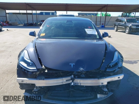 2022 Tesla Model 3 Long Range z VIN 5YJ3E1EB9NF197127, wystawiony jako IAAI lot #41366323 z przebiegiem 56 559 mil mil oraz . Historia ofert i sprzedaży dostępna na DreamBid. Obrazek 13.