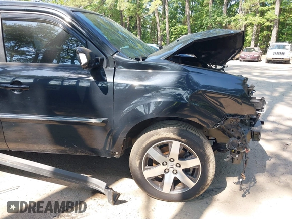 2013 Honda Pilot Touring with VIN 5FNYF3H96DB011470, listed as a IAAI auction lot 42535022 with 201,380 mi miles and . Bid and sale history available at DreamBid. Image 18.
