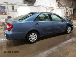 2004 Toyota Camry LE with VIN 4T1BE32K64U812388, listed as a Copart auction lot 82777563 with 209,219 mi miles and Clean Title. Bid and sale history available at carsss.com. Image 3.