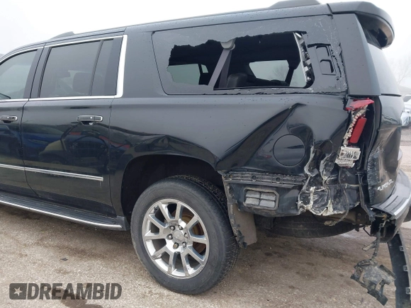 2017 GMC Yukon XL Denali with VIN 1GKS2HKJ2HR310377, listed as a IAAI auction lot 41153582 with 130,194 mi miles. Bid and sale history available at carsss.com. Image 6.