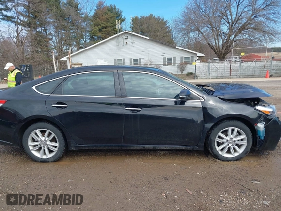 2014 Toyota Avalon Limited with VIN 4T1BK1EB2EU103936, listed as a IAAI auction lot 41703894 with 104,657 mi miles. Bid and sale history available at carsss.com. Image 14.