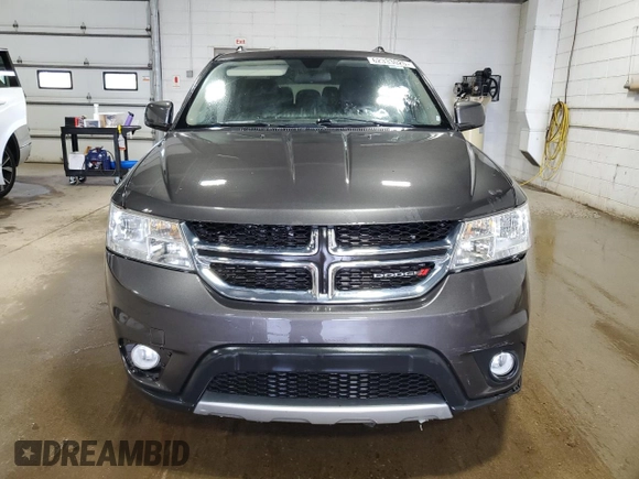 2017 Dodge Journey SXT z VIN 3C4PDDBGXHT592459, wystawiony jako Copart lot #62333025 z przebiegiem 134 778 mil mil oraz Czysty tytuł • Clean title. Historia ofert i sprzedaży dostępna na DreamBid. Obrazek 5.