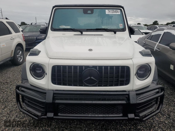 2021 Mercedes-Benz G 63 AMG z VIN W1NYC7HJXMX368367, wystawiony jako Copart lot #74120404 z przebiegiem 26 246 mil mil oraz Szkoda całkowita • Salvage title. Historia ofert i sprzedaży dostępna na DreamBid. Obrazek 5.