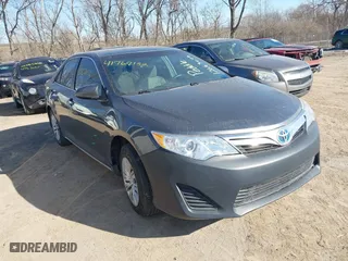 2013 Toyota Camry Hybrid LE with VIN 4T1BD1FK9DU081974, listed as a IAAI auction lot 41767152 with 188,059 mi miles. Bid and sale history available at carsss.com. Image 1.