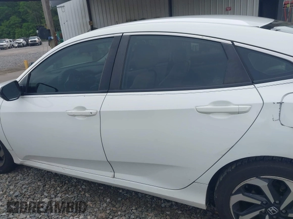 2017 Honda Civic LX with VIN 19XFC2F58HE010262, listed as a IAAI auction lot 42118124 with 125,535 mi miles and . Bid and sale history available at DreamBid. Image 14.