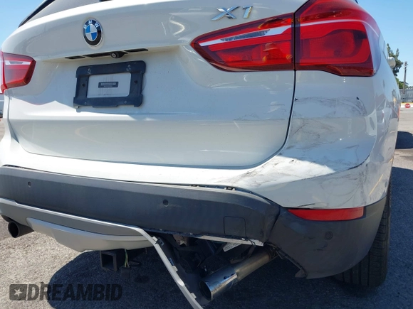 2017 BMW X1 xDrive28i with VIN WBXHT3C33H5F86831, listed as a IAAI auction lot 42019082 with 74,708 mi miles and . Bid and sale history available at DreamBid. Image 17.
