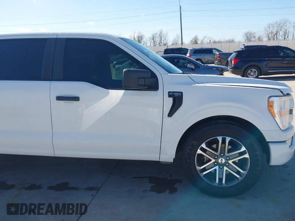 2021 Ford F-150 XL with VIN 1FTEW1CP2MFA09742, listed as a IAAI auction lot 41675603 with 94,983 mi miles. Bid and sale history available at carsss.com. Image 14.