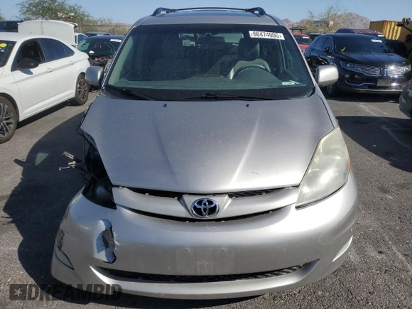 2010 Toyota Sienna XLE with VIN 5TDYK4CC3AS324570, listed as a Copart auction lot 60474005 with 259,128 mi miles and Salvage title. Bid and sale history available at DreamBid. Image 5.