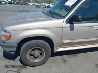 1998 Ford Explorer XL z VIN 1FMZU34E0WZA85991, wystawiony jako IAAI lot #42136398 z przebiegiem 221 454 mil mil oraz . Historia ofert i sprzedaży dostępna na DreamBid. Obrazek 6.