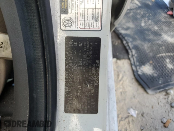 2009 Kia Spectra EX with VIN KNAFE221195630944, listed as a Copart auction lot 42291345 with 83,269 mi miles and Salvage Title. Bid and sale history available at DreamBid. Image 12.