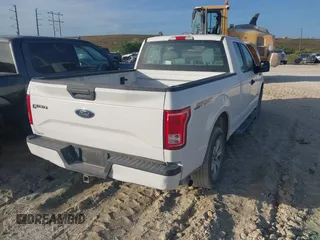 2015 Ford F-150 XL with VIN 1FTEX1CP9FFC31176, listed as a IAAI auction lot 41949354 with 130,118 mi miles. Bid and sale history available at carsss.com. Image 4.