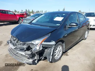 2016 Toyota Prius Two with VIN JTDKBRFU9G3021083, listed as a IAAI auction lot 41986733 with 117,227 mi miles and . Bid and sale history available at DreamBid. Image 2.