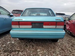 1992 Plymouth Acclaim z VIN 1P3XA4631NF248220, wystawiony jako Copart lot #84113754 z przebiegiem 117 489 mil mil oraz Szkody całkowita. Historia ofert i sprzedaży dostępna na DreamBid. Obrazek 6.