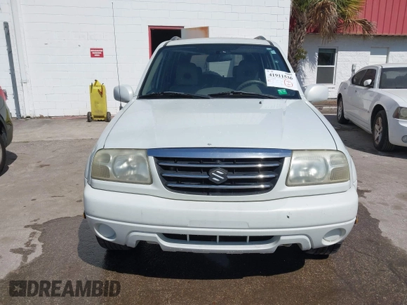 2003 Suzuki XL-7 Touring with VIN JS3TX92V934104149, listed as a IAAI auction lot 41911536 with 140,199 mi miles. Bid and sale history available at carsss.com. Image 6.