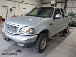 2000 Ford F-150 XL with VIN 1FTRX18L4YNB66317, listed as a IAAI auction lot 41932247 with 1 mi miles. Bid and sale history available at carsss.com. Image 2.