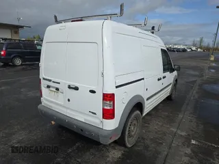 2012 Ford Transit Connect XL z VIN NM0LS7AN5CT084570, wystawiony jako IAAI lot #41962914 z przebiegiem 148 751 mil mil oraz . Historia ofert i sprzedaży dostępna na DreamBid. Obrazek 1.